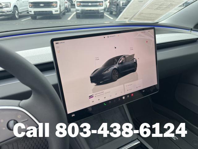 used 2025 Tesla Model 3 car, priced at $35,104