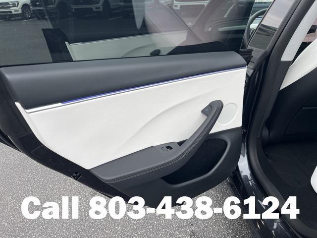 used 2025 Tesla Model 3 car, priced at $35,104