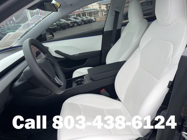 used 2025 Tesla Model 3 car, priced at $35,104