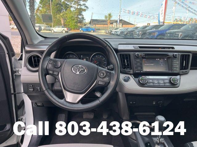 used 2018 Toyota RAV4 car, priced at $19,237