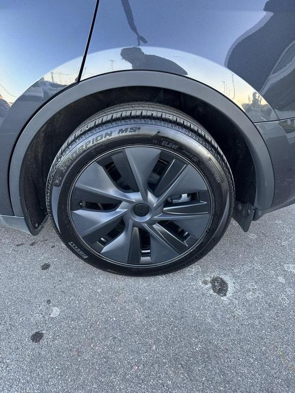 used 2024 Tesla Model Y car, priced at $28,999
