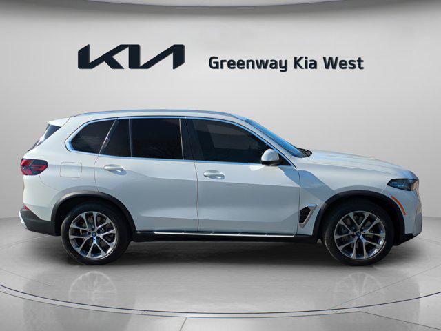 used 2025 BMW X5 PHEV car, priced at $62,500