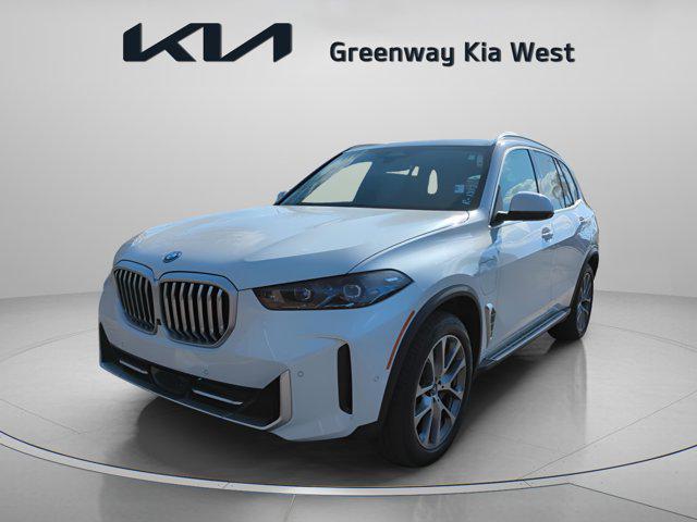 used 2025 BMW X5 PHEV car, priced at $62,500