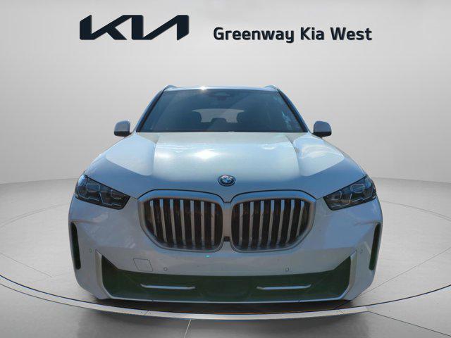 used 2025 BMW X5 PHEV car, priced at $62,500