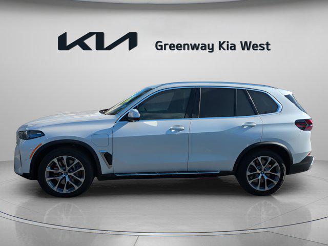 used 2025 BMW X5 PHEV car, priced at $62,500