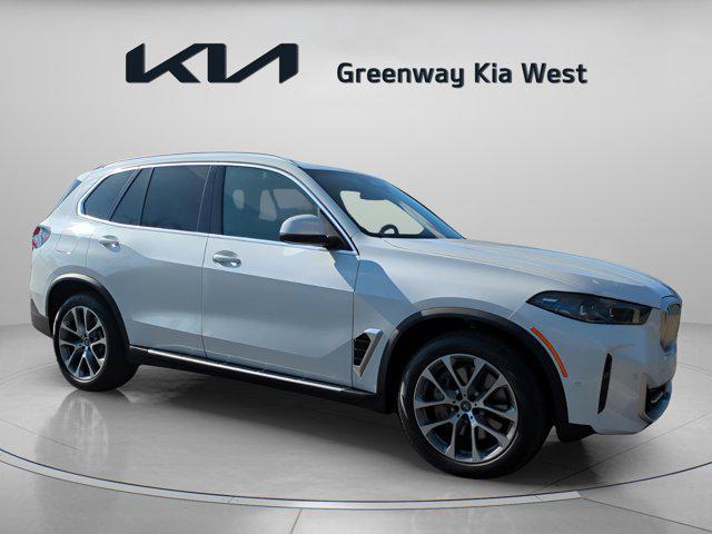 used 2025 BMW X5 PHEV car, priced at $62,500