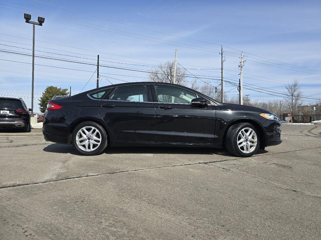 used 2015 Ford Fusion car, priced at $6,540