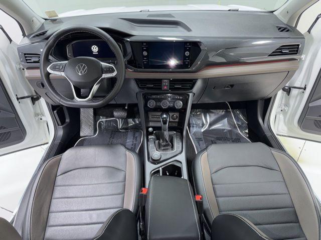 used 2023 Volkswagen Taos car, priced at $25,458