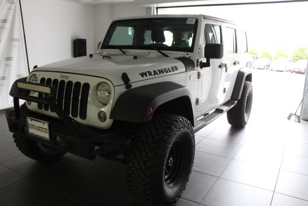 used 2016 Jeep Wrangler Unlimited car, priced at $13,998