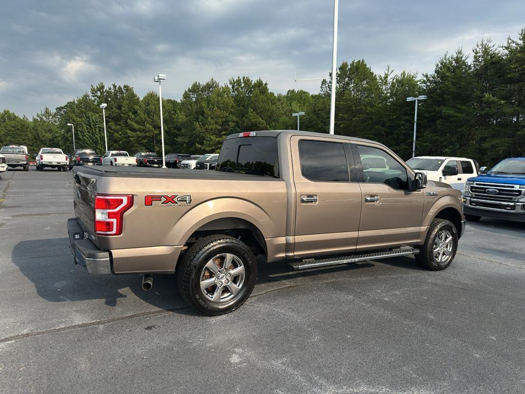used 2018 Ford F-150 car, priced at $23,630
