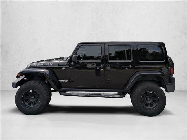 used 2012 Jeep Wrangler Unlimited car, priced at $16,601