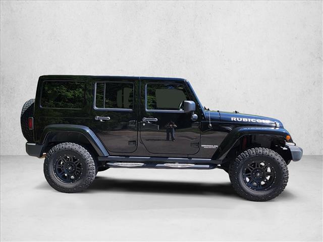 used 2012 Jeep Wrangler Unlimited car, priced at $16,601