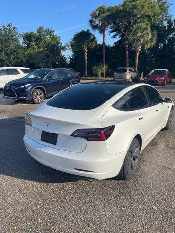 used 2023 Tesla Model 3 car, priced at $27,821