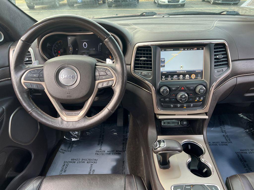 used 2014 Jeep Grand Cherokee car, priced at $14,000