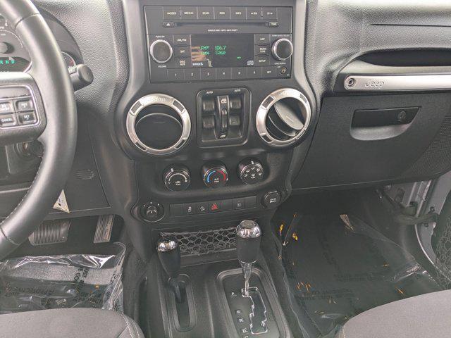 used 2013 Jeep Wrangler Unlimited car, priced at $12,994