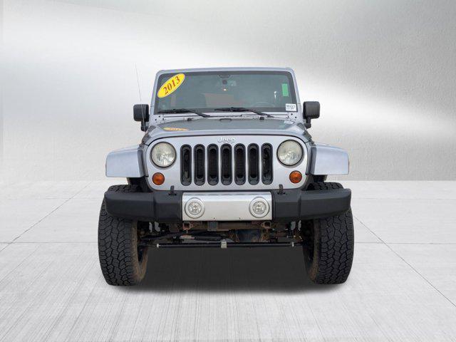 used 2013 Jeep Wrangler Unlimited car, priced at $12,994