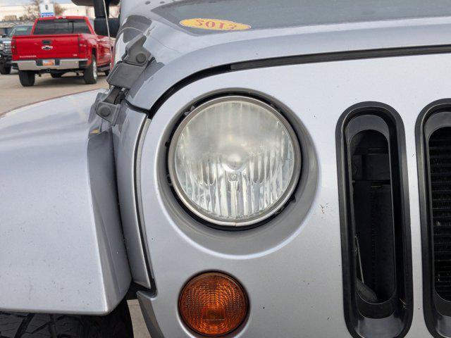 used 2013 Jeep Wrangler Unlimited car, priced at $12,994