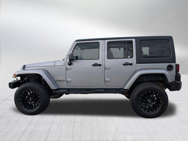 used 2013 Jeep Wrangler Unlimited car, priced at $12,994