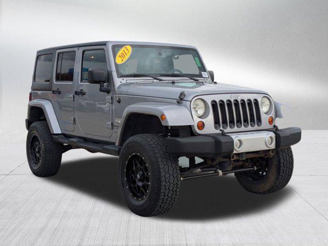 used 2013 Jeep Wrangler Unlimited car, priced at $12,994