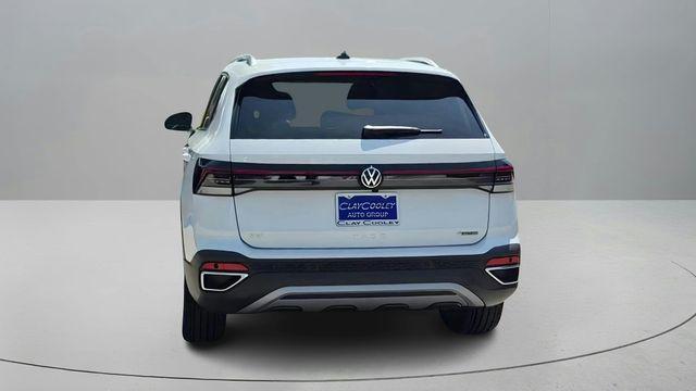 new 2025 Volkswagen Taos car, priced at $30,869