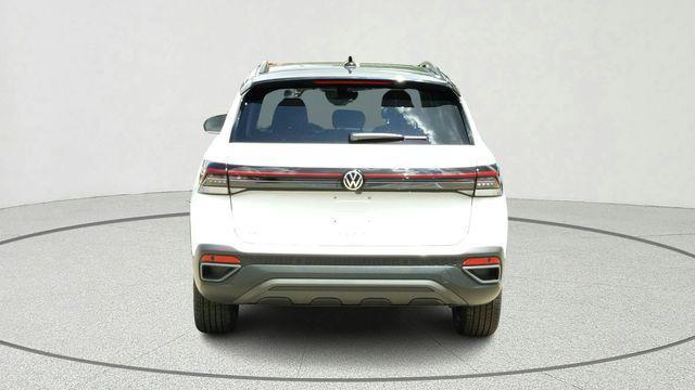 new 2025 Volkswagen Taos car, priced at $27,028