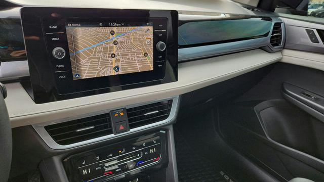 used 2025 Volkswagen Taos car, priced at $30,714