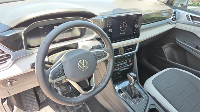 new 2025 Volkswagen Taos car, priced at $26,823