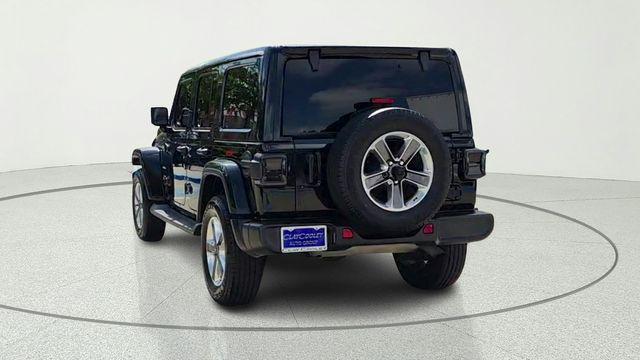used 2021 Jeep Wrangler Unlimited car, priced at $23,557