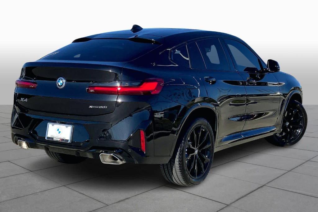 used 2025 BMW X4 car, priced at $54,900