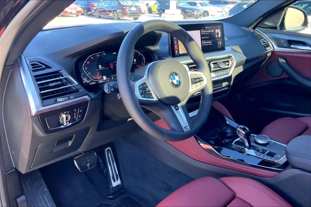used 2025 BMW X4 car, priced at $54,900