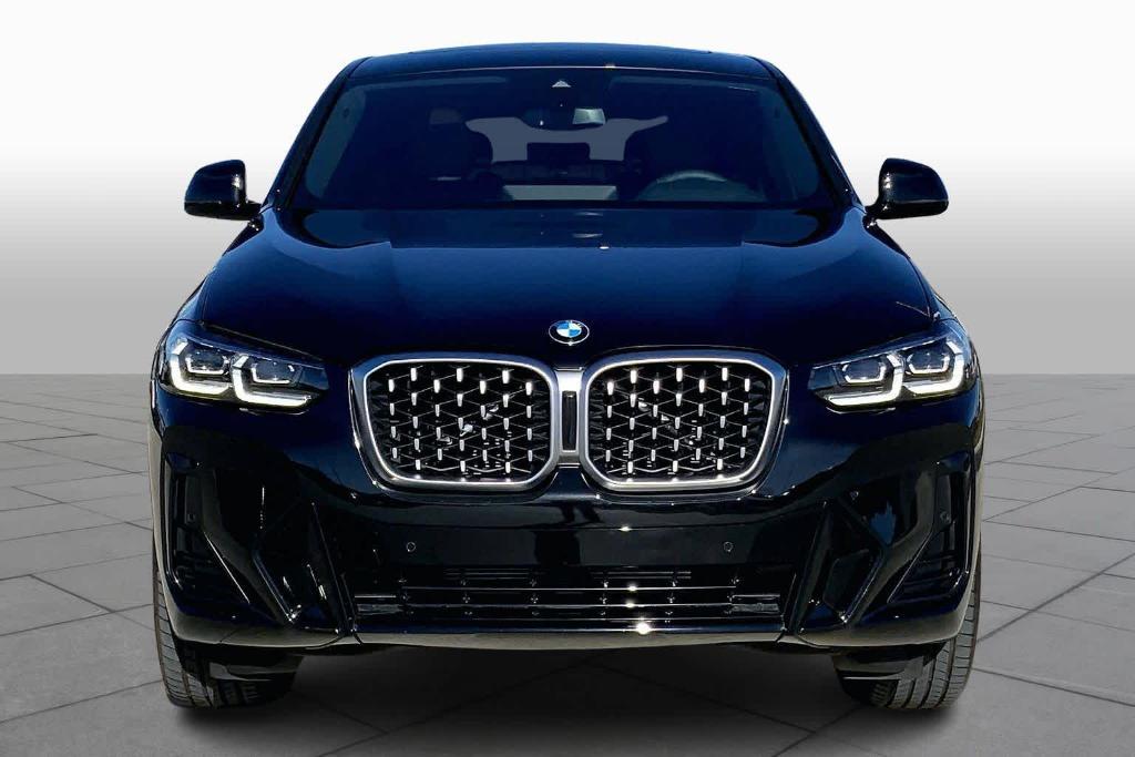 used 2025 BMW X4 car, priced at $54,900