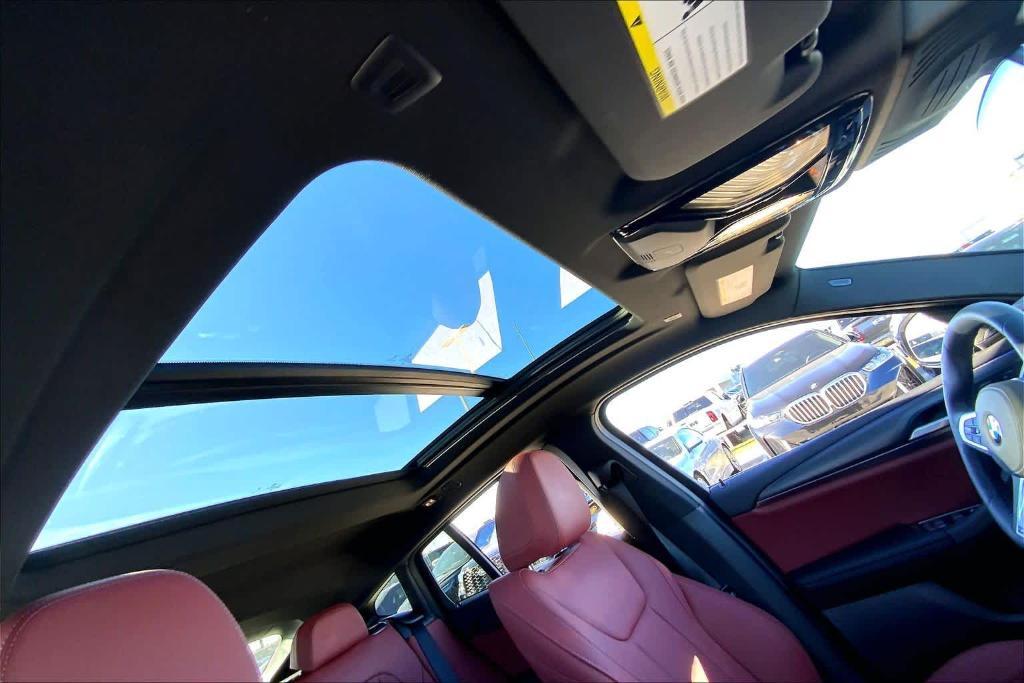 used 2025 BMW X4 car, priced at $54,900