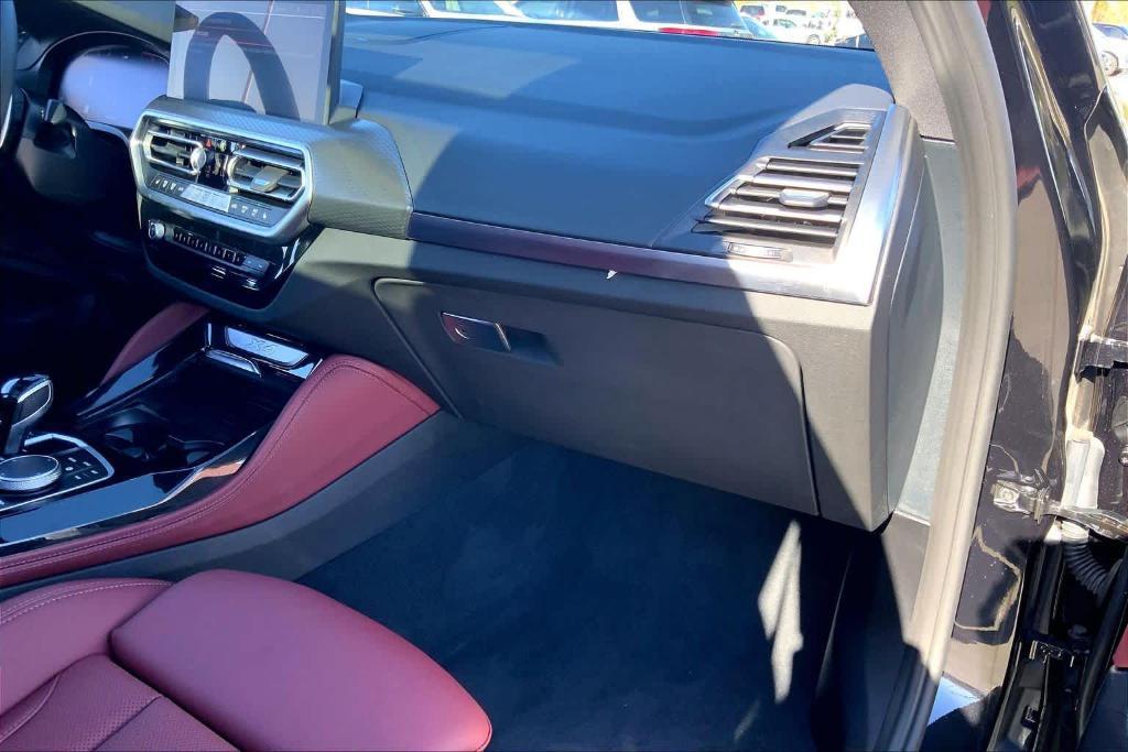 used 2025 BMW X4 car, priced at $54,900