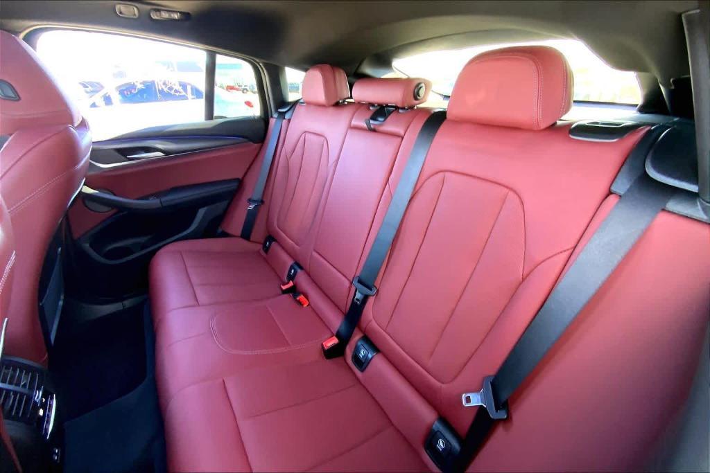 used 2025 BMW X4 car, priced at $54,900