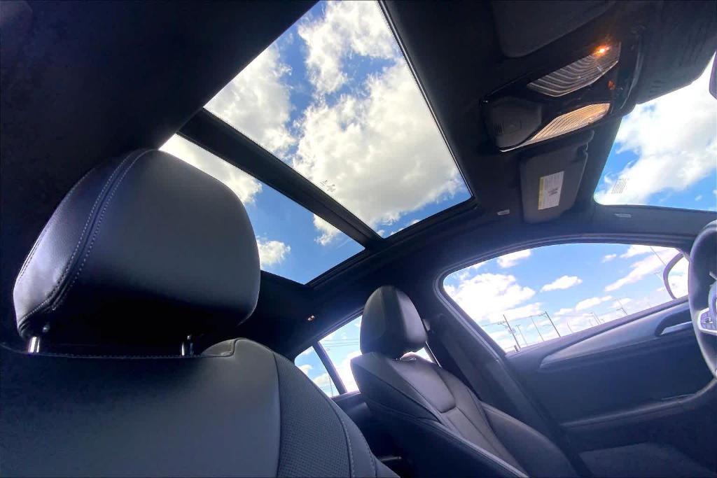 used 2023 BMW X4 car, priced at $51,900