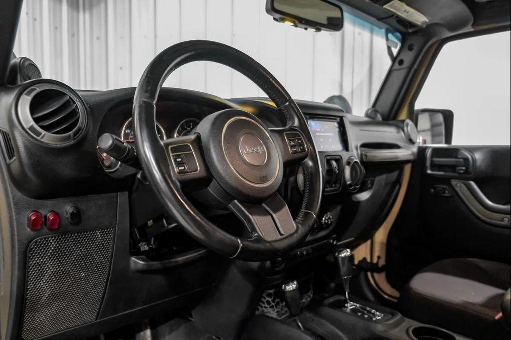 used 2014 Jeep Wrangler Unlimited car, priced at $15,595