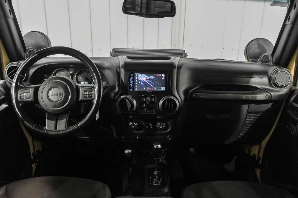 used 2014 Jeep Wrangler Unlimited car, priced at $15,595