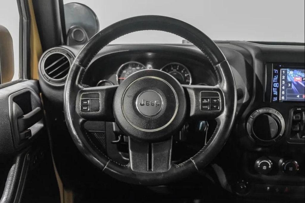 used 2014 Jeep Wrangler Unlimited car, priced at $15,595