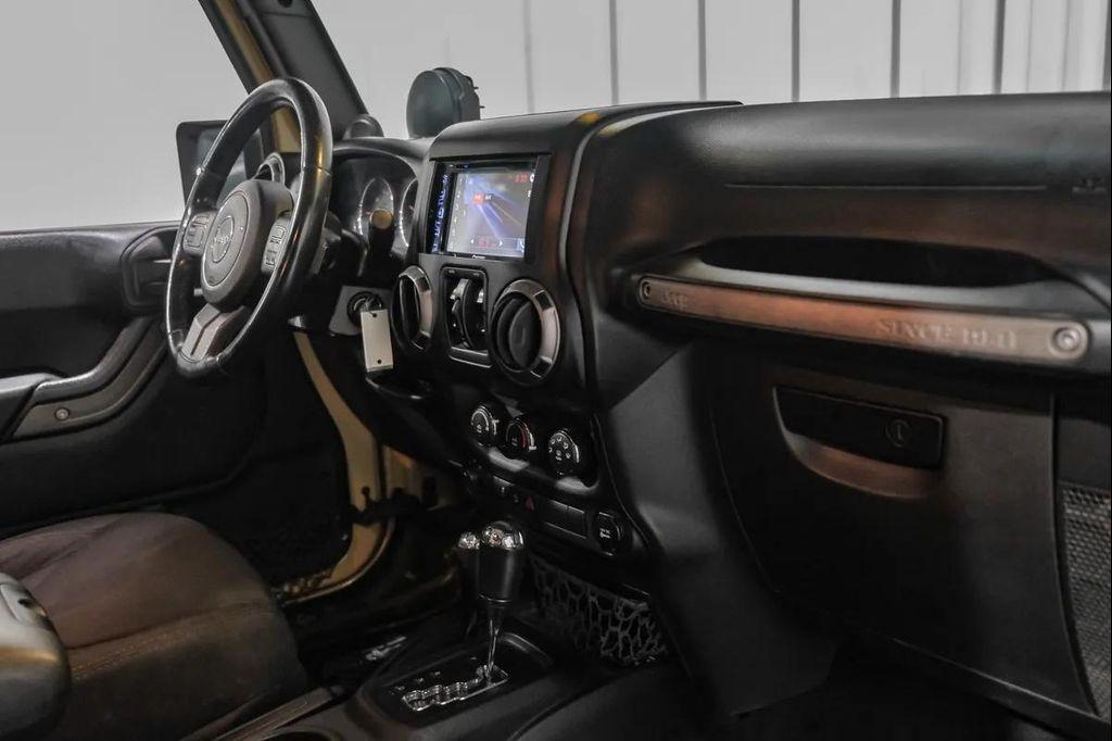 used 2014 Jeep Wrangler Unlimited car, priced at $15,595