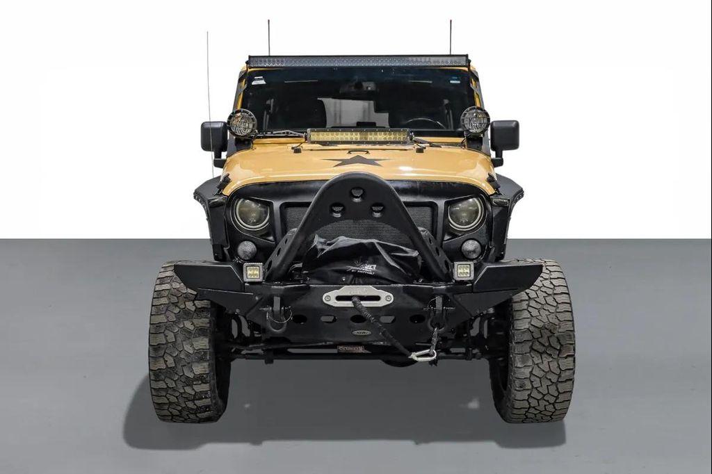 used 2014 Jeep Wrangler Unlimited car, priced at $15,595
