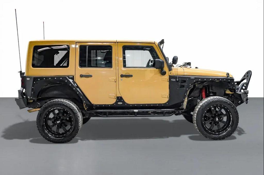used 2014 Jeep Wrangler Unlimited car, priced at $15,595