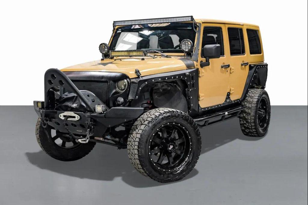 used 2014 Jeep Wrangler Unlimited car, priced at $15,595