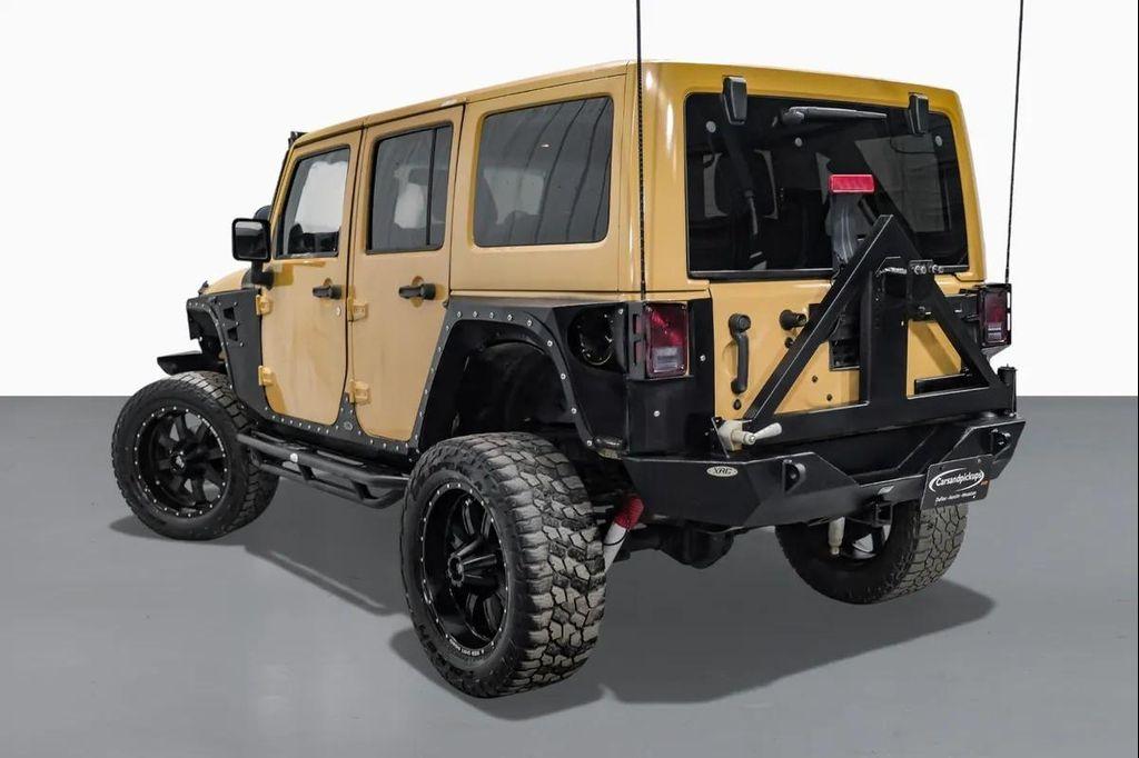 used 2014 Jeep Wrangler Unlimited car, priced at $15,595