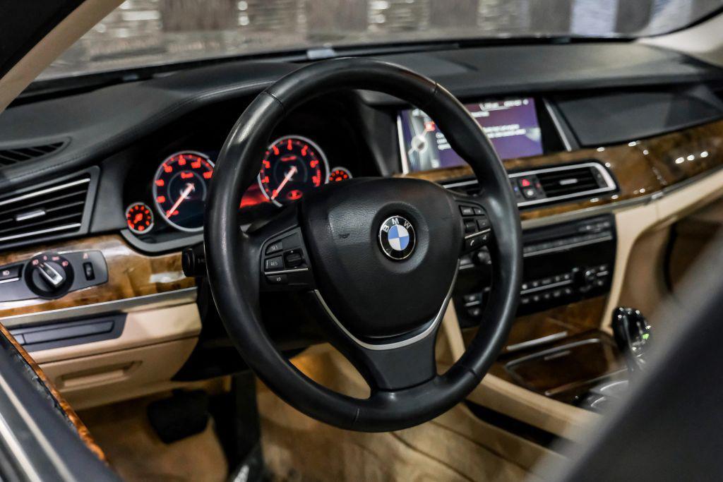 used 2014 BMW 740 car, priced at $13,996