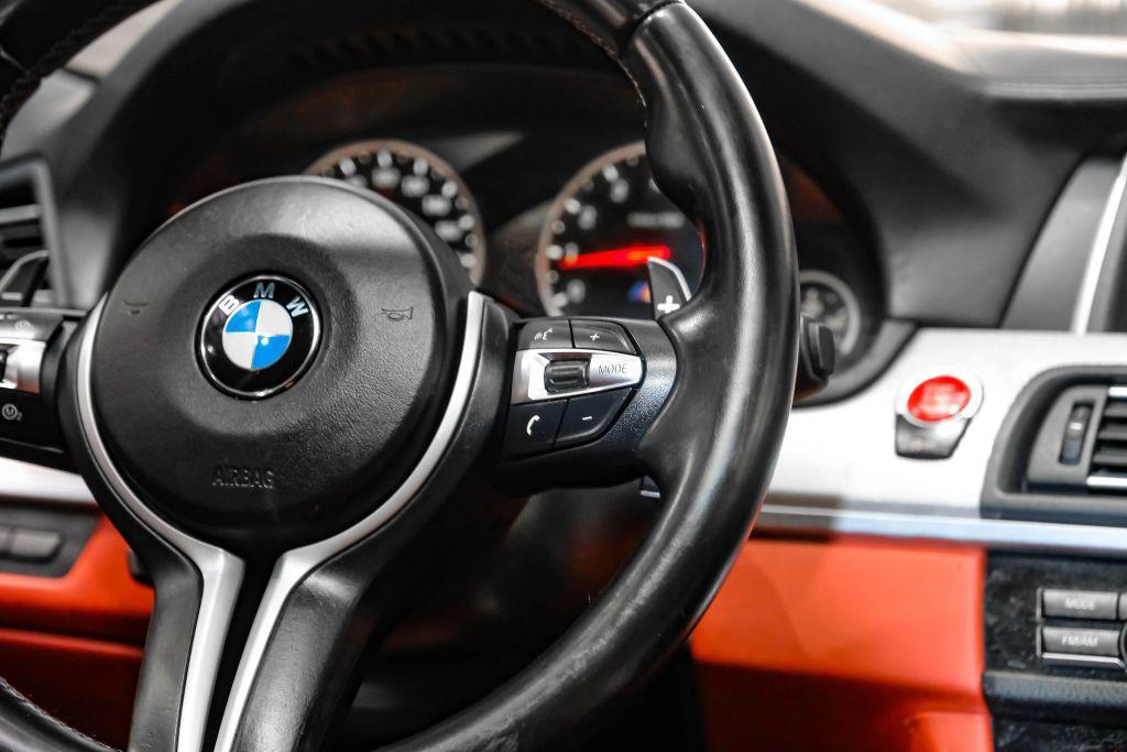 used 2014 BMW M5 car, priced at $32,221