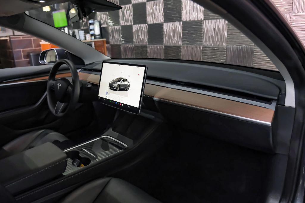 used 2023 Tesla Model 3 car, priced at $26,996