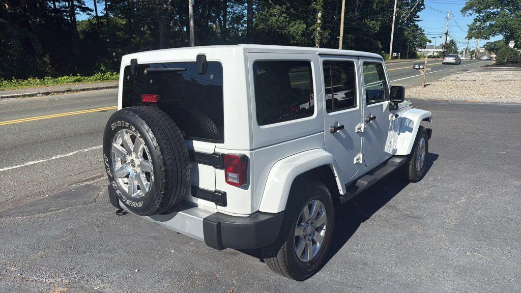 used 2015 Jeep Wrangler Unlimited car, priced at $13,995