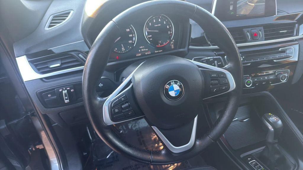 used 2018 BMW X1 car, priced at $19,995