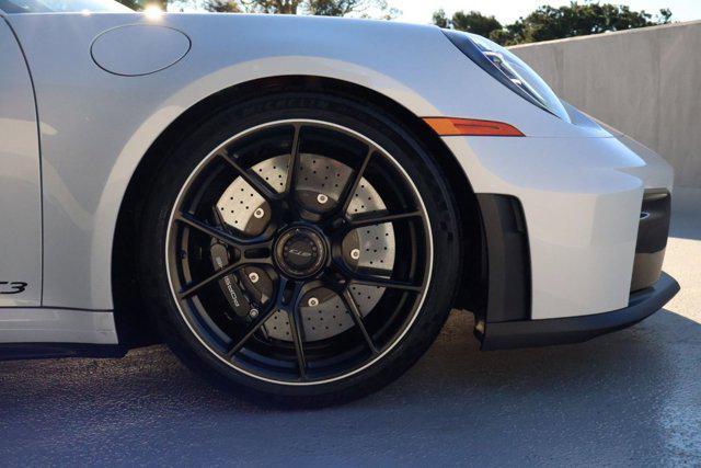 new 2026 Porsche 911 car, priced at $303,320