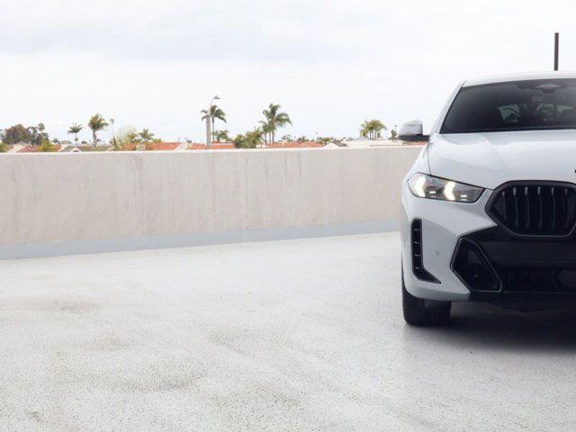 used 2024 BMW X6 car, priced at $64,800